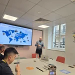 Kontroversi Lingkungan, Rekrutmen Massal, dan Inisiatif Gizi: Danone di Tengah Sorotan Global